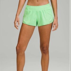 Lululemon bright green hotty hot shorts in scream green high rise 2.5